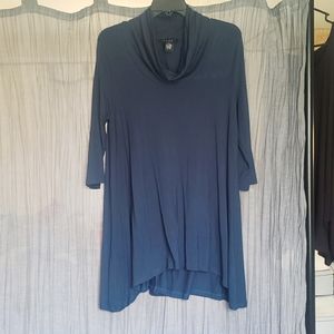 Cowl neck, long, tunic style shirt.